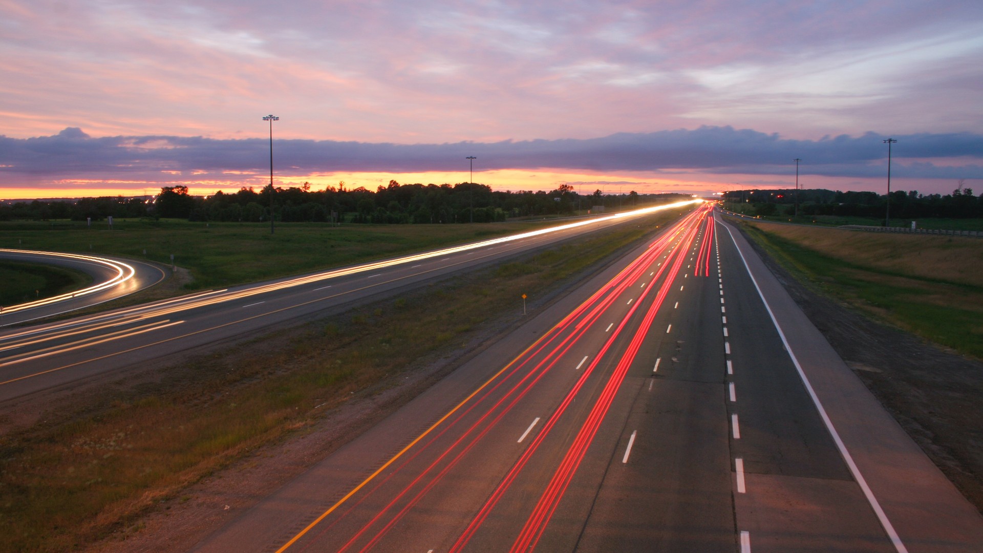 cars-night-blurred-highway-68629.jpg