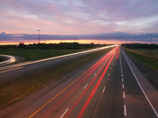 cars-night-blurred-highway-68629.jpg