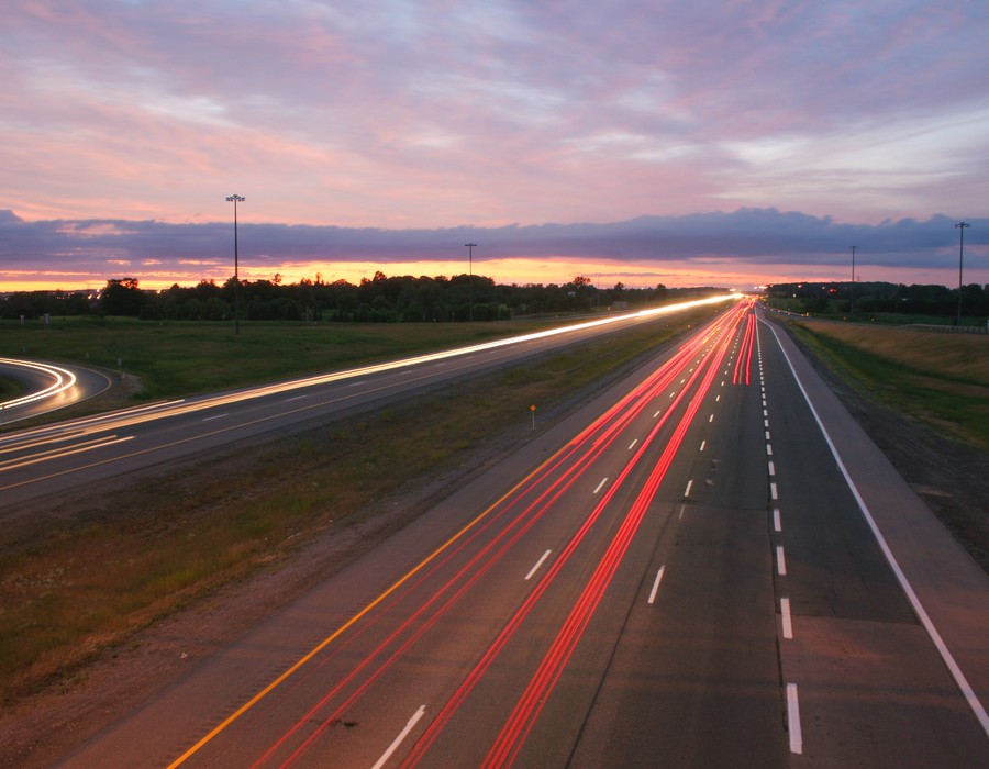 cars-night-blurred-highway-68629.jpg